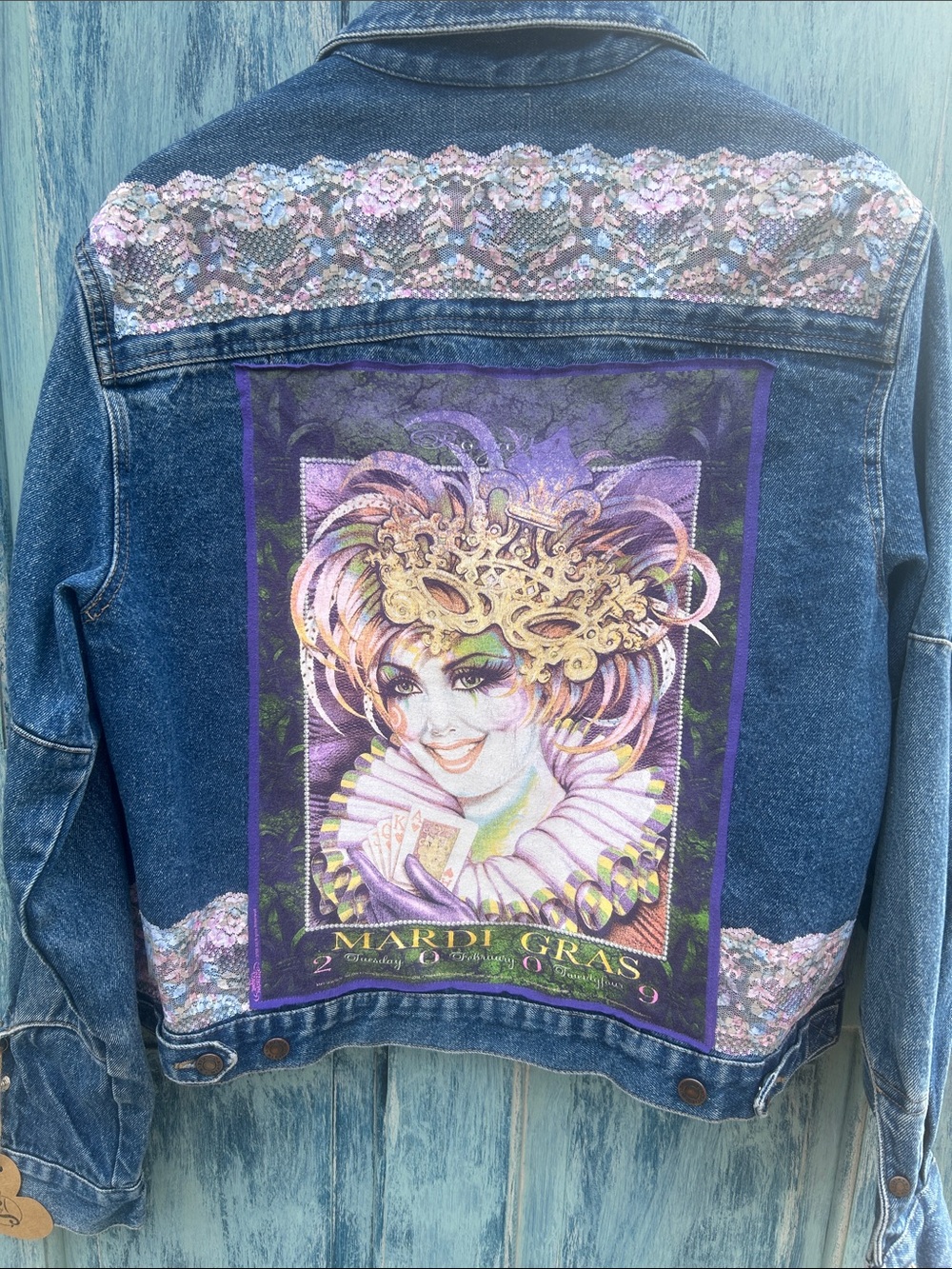 Upcycled vintage Mardi Gras and lace patched Calvin Klein Jean jacket